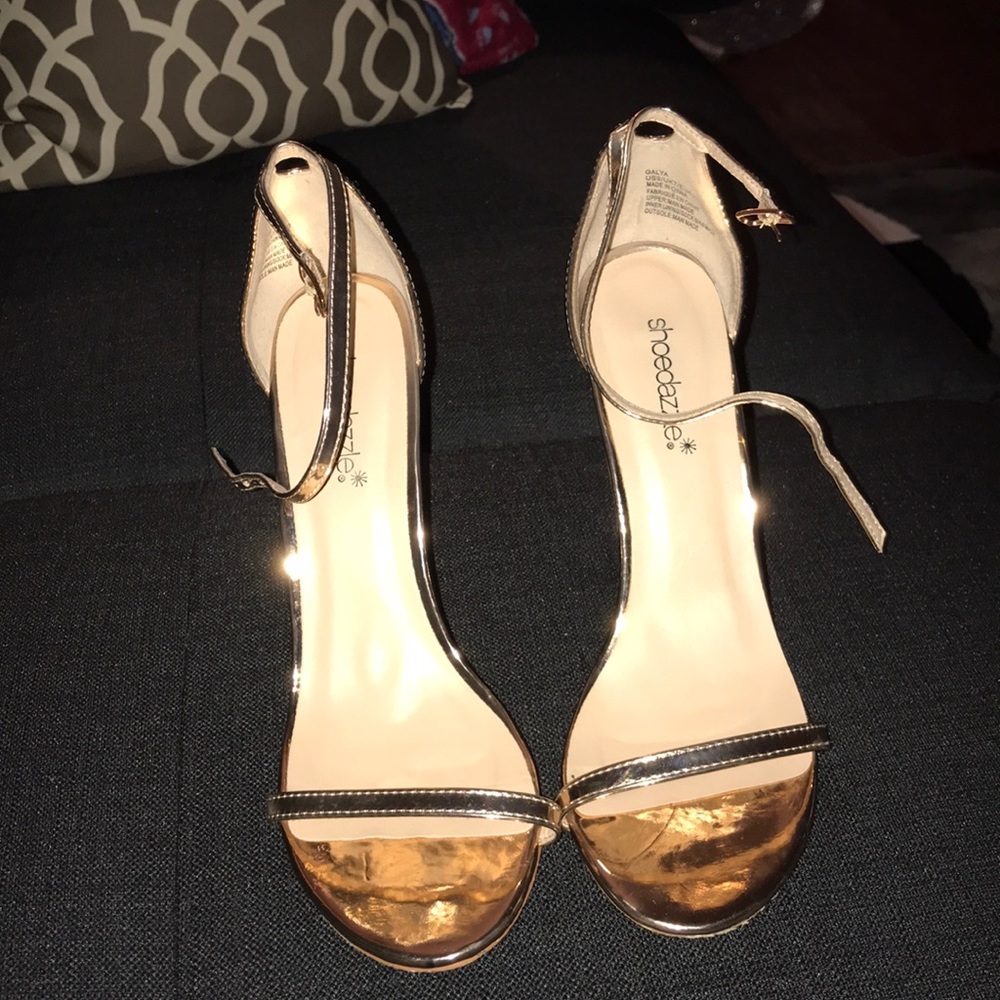 Gold heels in great condition.